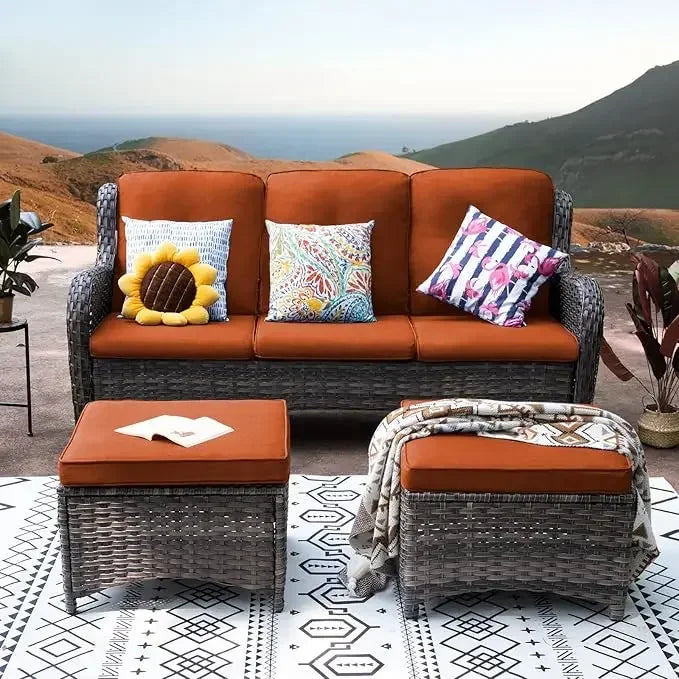 Three Piece Wicker Outdoor Conversation Set With Sofa Ottomans